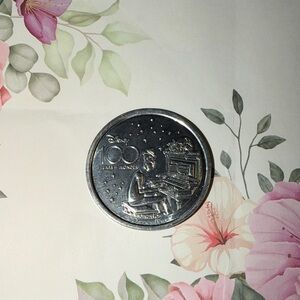 Disney Silver Coin with Musical Design